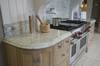 <B>The subtle colours of the River White granite blends in well with these units. It is shown here with a special edge detail and splashback.