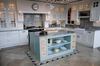 <B>Worktops splashback and Island unit top all manufactured from Piracema Granite.